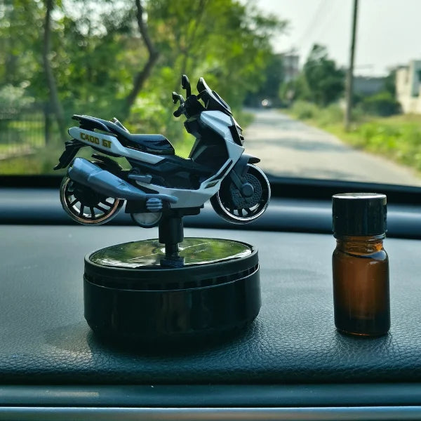 Car Dashboard Solar Air Freshener Scooty with Refill Perfume
